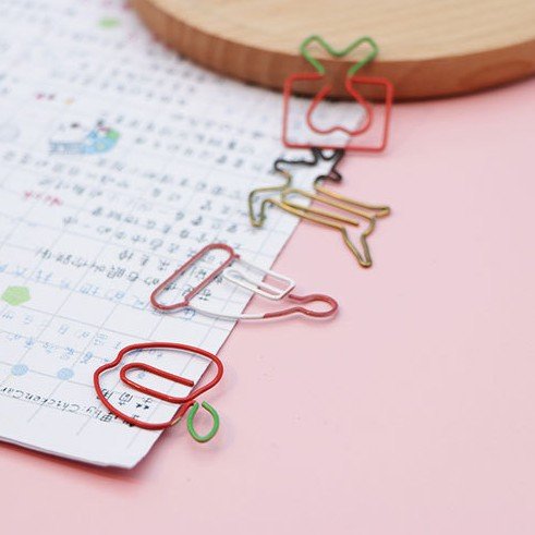 christmas tree and santa hat shaped paper clips