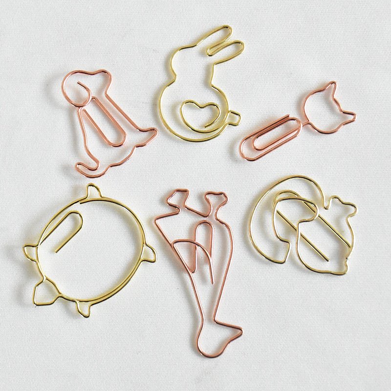 gold animal shaped metal paper clips
