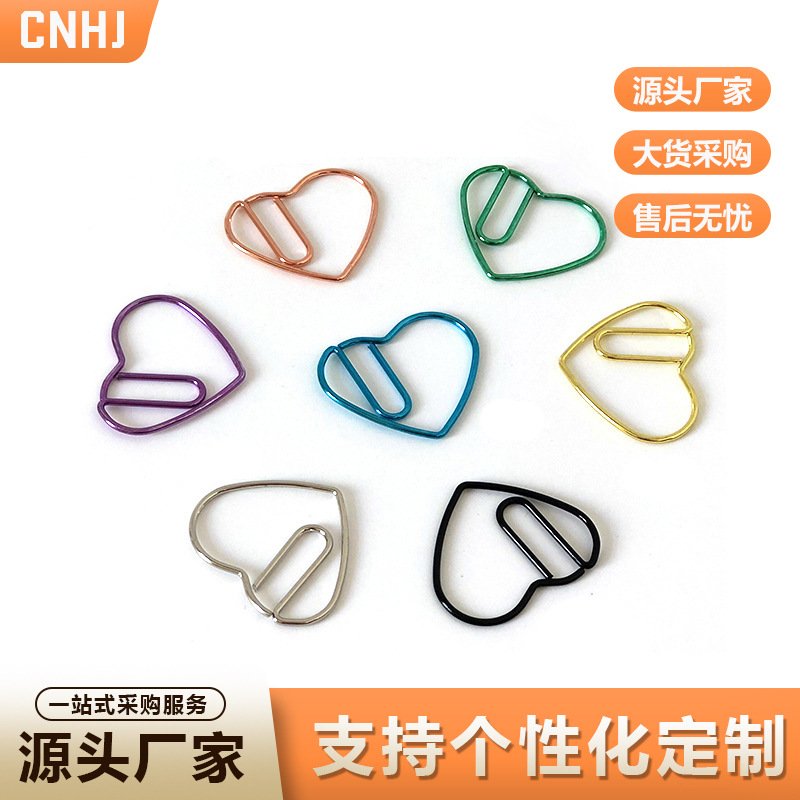 gold love letter shaped creative heart paper clips