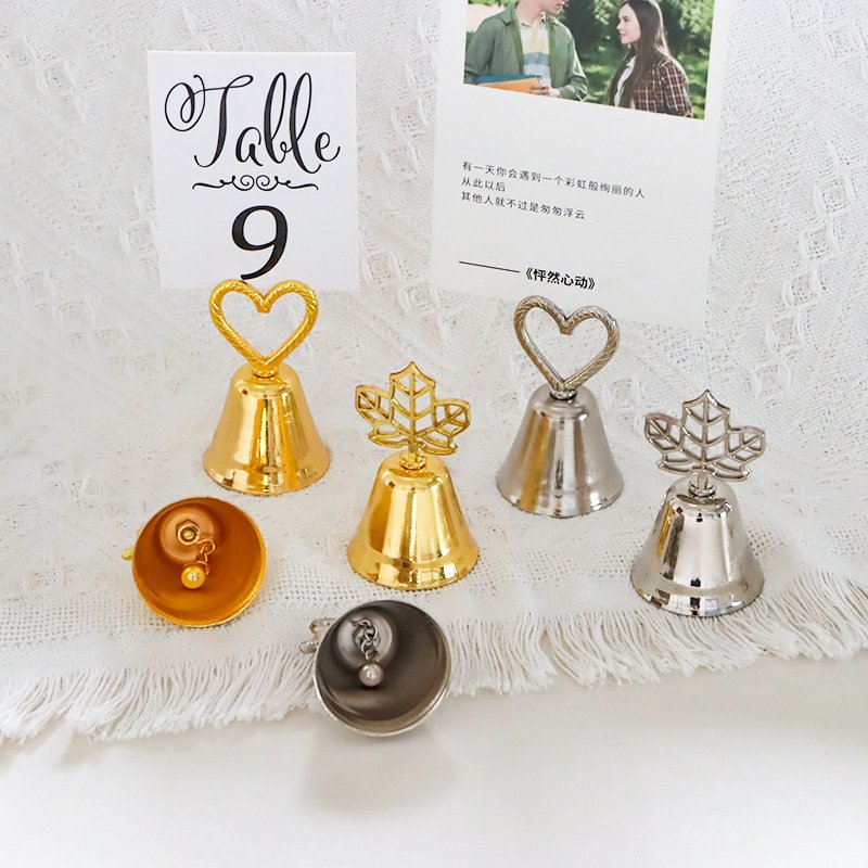 metal bell shaped place card clip for christmas weddings