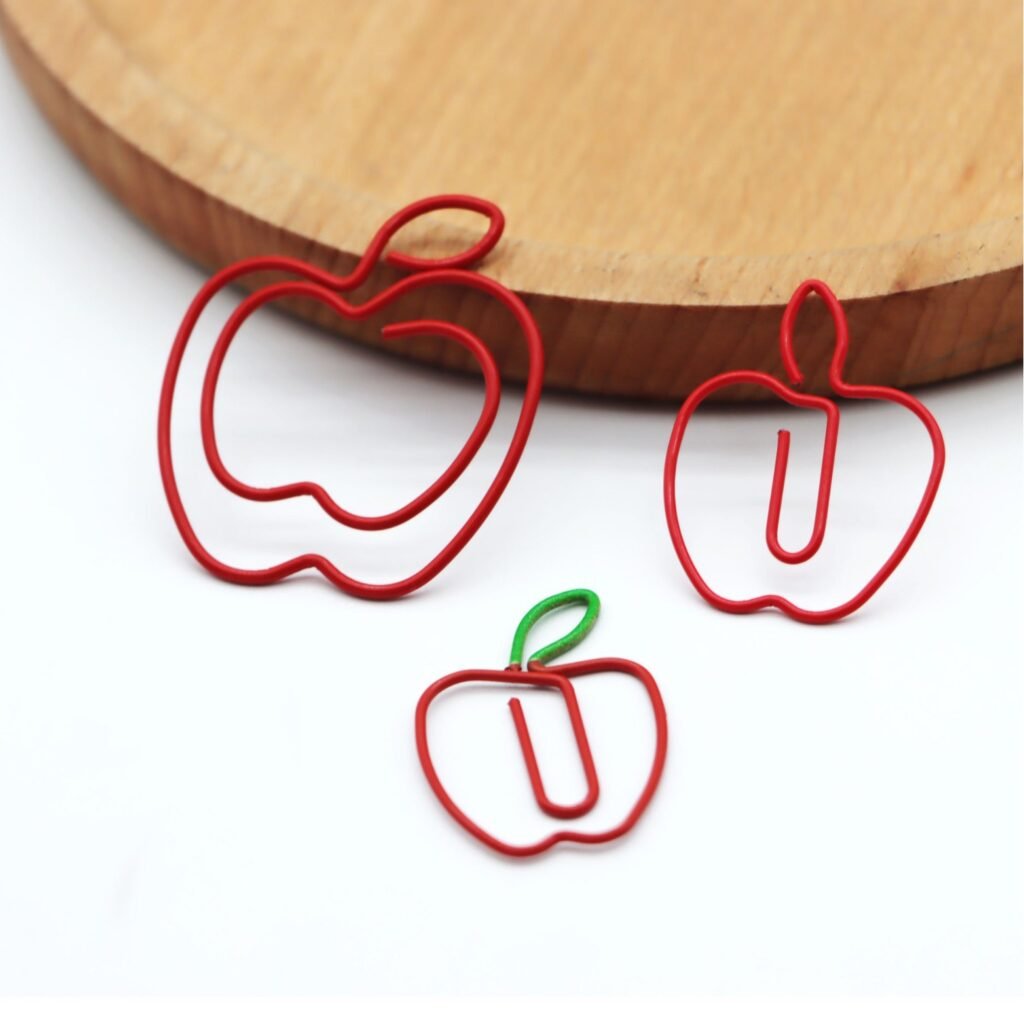 red apple shaped paper clips for halloween and journaling
